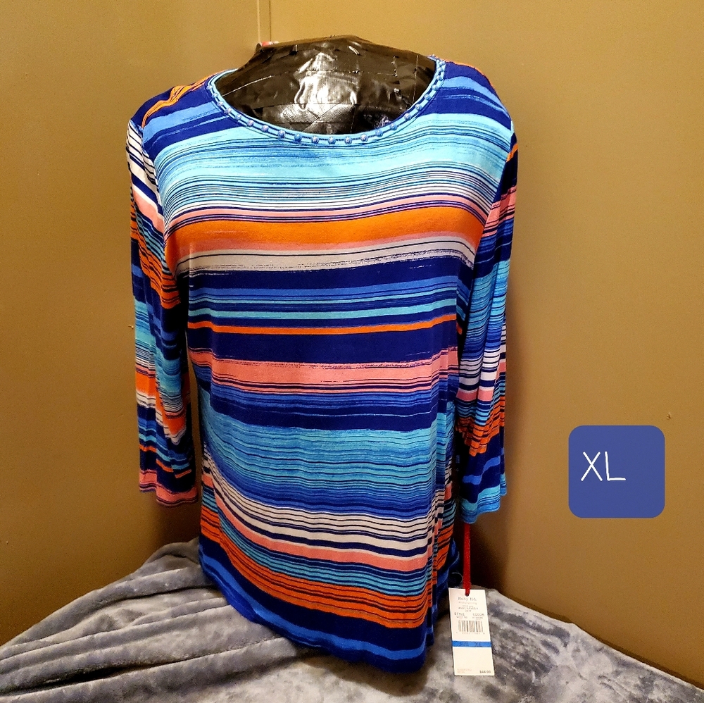 Xl Womens stretchy tops . Never been worn